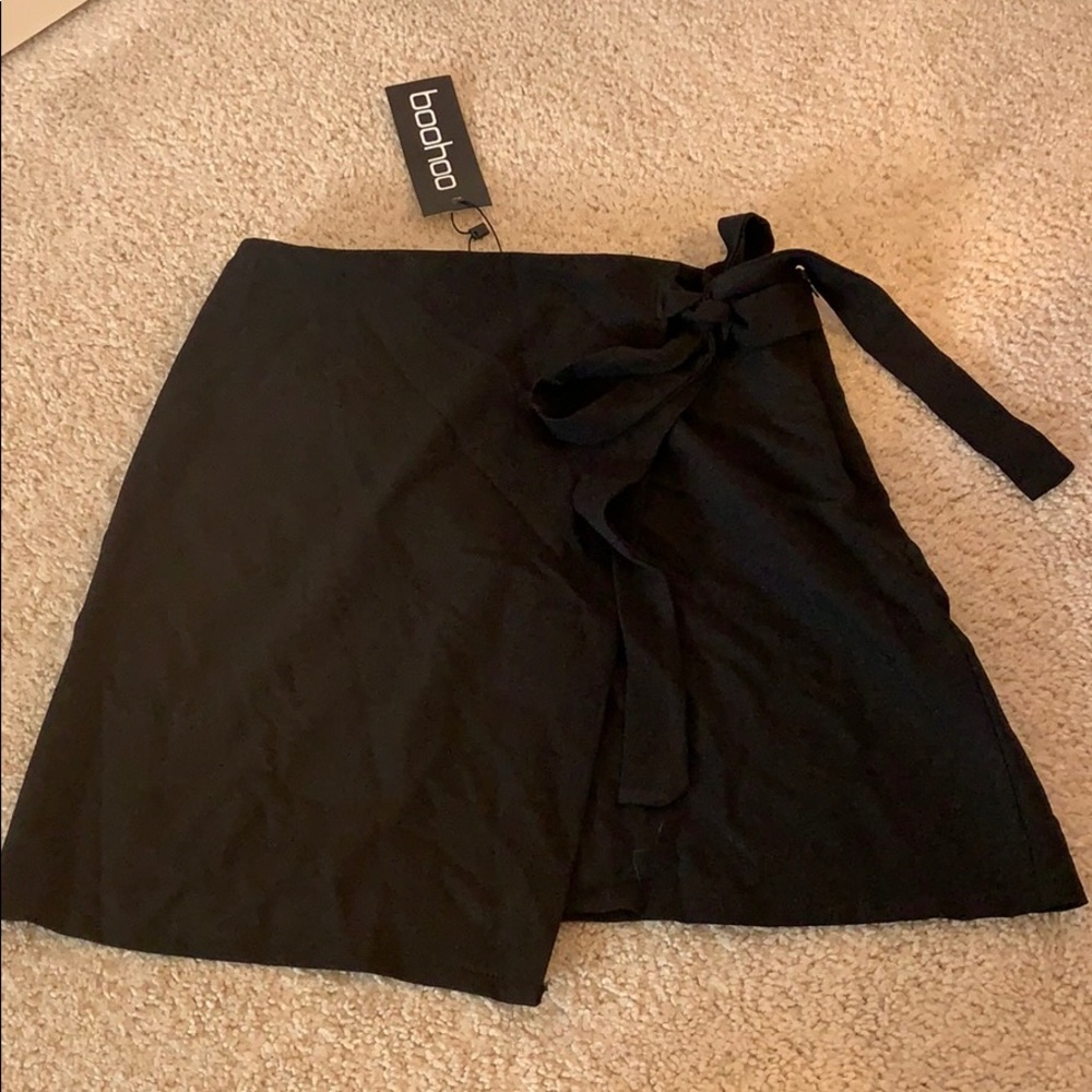 Black wrap asymmetrical skirt